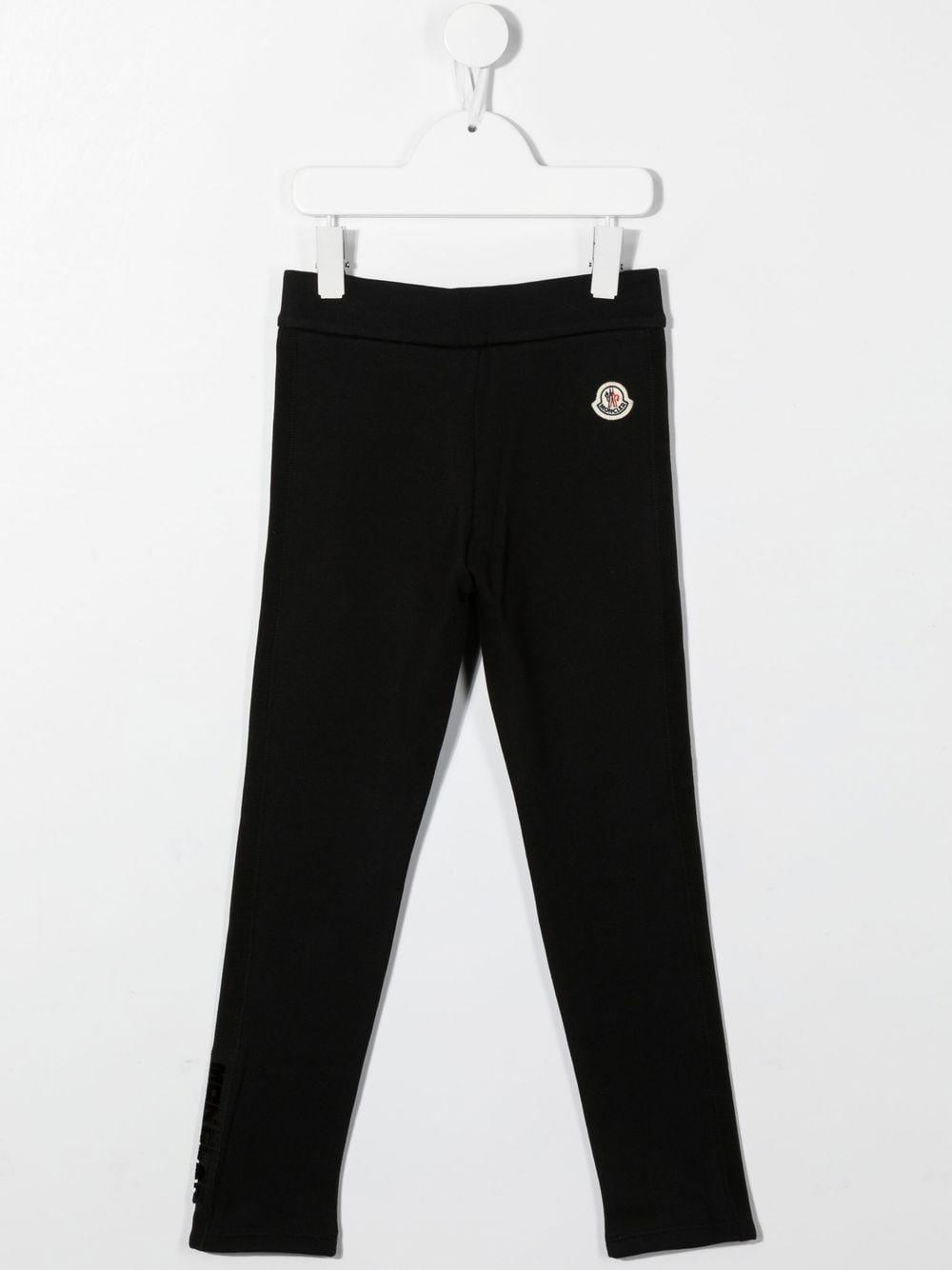 Shop Moncler Trousers With Logo In Nero